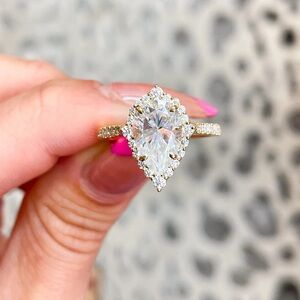 14K yellow gold Pear Moissanite Halo Ring